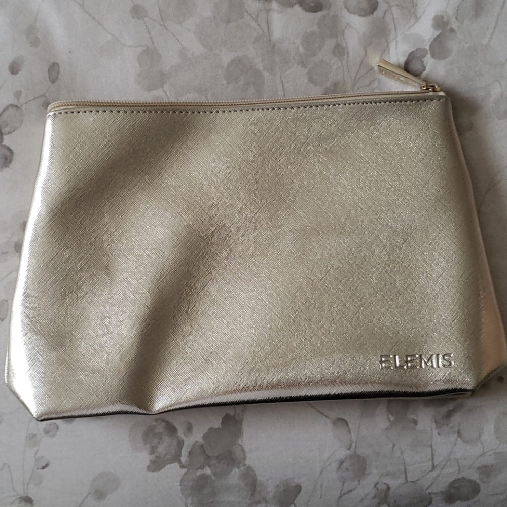 Brand new gold Elemis makeup/toiletry bag
